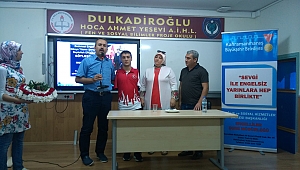 MİLLİ YÜZÜCÜ EROĞLU ÖĞRENCİLERLE BULUŞTU