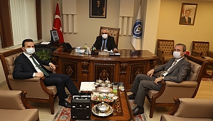 TÜRKİYE ULUSAL AJANSI BAŞKANI İLKER ASTARCI KİÜ REKTÖRÜ PROF. DR. SAMİ ÖZGÜL’Ü ZİYARET ETTİ