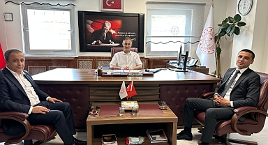 MHP İl Baskanı Demiröz ve Milletvekili Adayı Aziz Kömürcü'den Mart' a Ziyaret