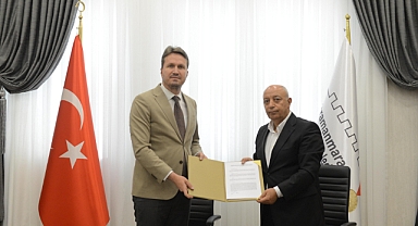 KİÜ ve Büyükşehir Belediyesi Arasında İş Birliği Protokolü İmzalandı