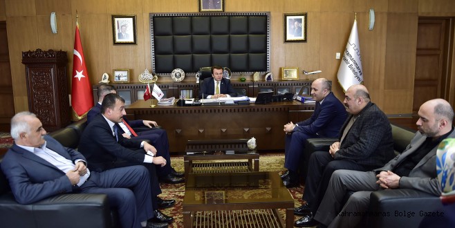 MHP’DEN BAŞKAN ERKOÇ’A ANLAMLI HEDİYE