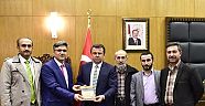 UFKA YOLCULUK EKİBİ BAŞKAN ERKOÇ'U ZİYARET ETTİ